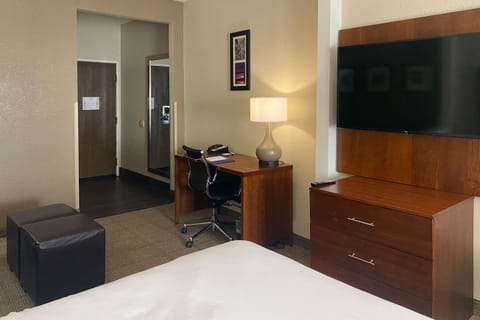 Suite, 2 Queen Beds, Non Smoking | Desk, laptop workspace, blackout drapes, iron/ironing board