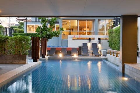 Outdoor pool, pool umbrellas, sun loungers