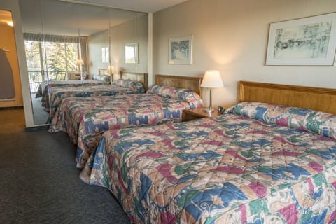 Room, 2 Queen Beds | Desk, iron/ironing board, cribs/infant beds, free WiFi