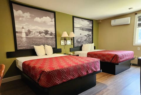 Room, 2 Queen Beds, Non Smoking (Efficiency) | Desk, iron/ironing board, bed sheets, alarm clocks