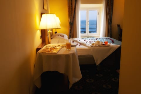 Double or Twin Room, Sea View | Minibar, in-room safe, desk, soundproofing