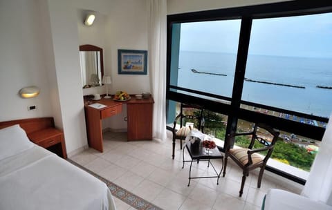 Deluxe Double Room, Sea View | Premium bedding, minibar, in-room safe, desk
