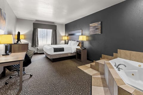 Suite, 1 King Bed, Non Smoking, Jetted Tub | Premium bedding, in-room safe, desk, blackout drapes