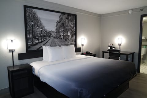 Premium bedding, pillowtop beds, desk, laptop workspace