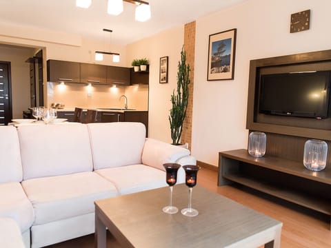 Apartment, 1 Bedroom | Living room | Flat-screen TV