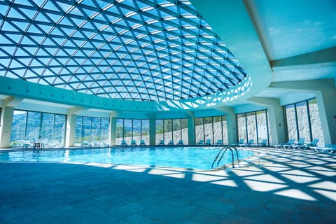 Indoor pool, 2 outdoor pools, open 8 AM to 11:00 PM, pool umbrellas