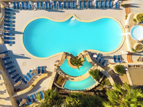 Outdoor pool, open 9:00 AM to 4:30 PM, pool umbrellas, sun loungers