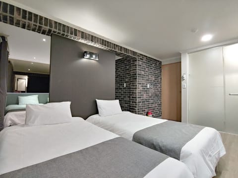 Superior Quadruple Room | Premium bedding, soundproofing, iron/ironing board, free WiFi