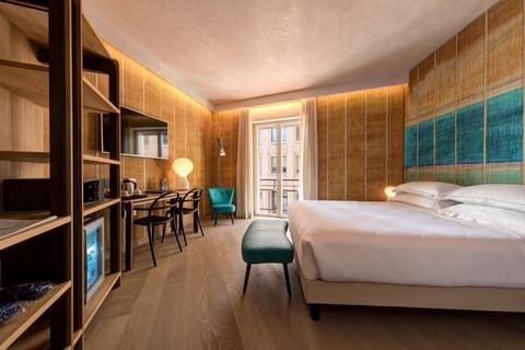 Premium Triple Room | Minibar, in-room safe, iron/ironing board, free WiFi