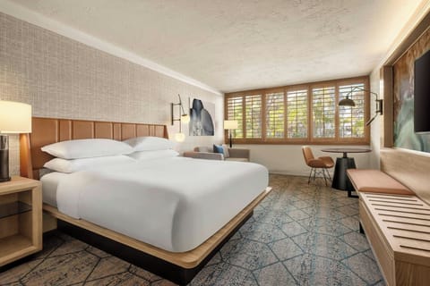 Down comforters, pillowtop beds, in-room safe, desk