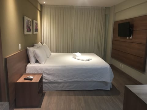 Standard Double Room, 1 King Bed, Non Smoking | Minibar, desk, blackout drapes, iron/ironing board