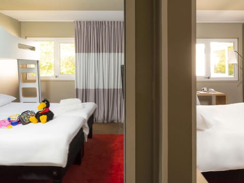 Family Suite, Multiple Beds | Premium bedding, desk, laptop workspace, blackout drapes