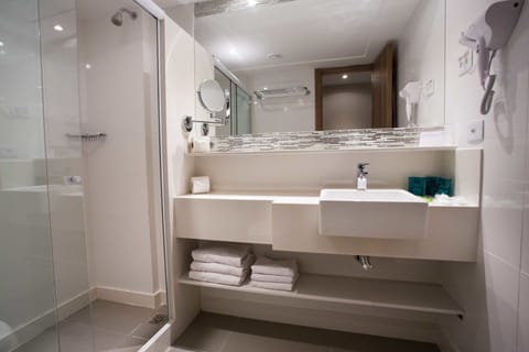 Shower, free toiletries, hair dryer, towels