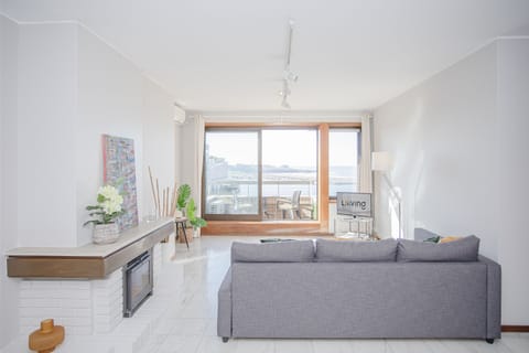 Apartment, 1 Bedroom, Sea View | Living area | Flat-screen TV