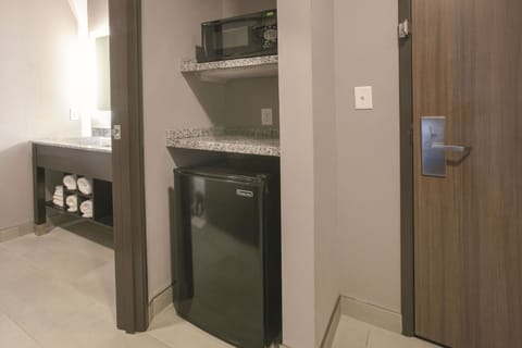 Room, 1 King Bed, Non Smoking | Pillowtop beds, desk, iron/ironing board, free cribs/infant beds