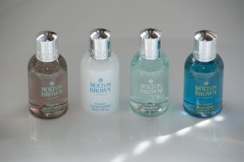 Deluxe Double Room, 1 Bedroom, Ocean View | Bathroom amenities | Designer toiletries, hair dryer, bathrobes, slippers