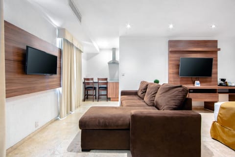 Suite, 1 King Bed, Non Smoking | Down comforters, in-room safe, individually decorated