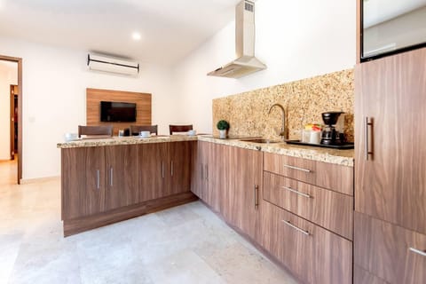 Suite, Multiple Beds | Down comforters, in-room safe, individually decorated