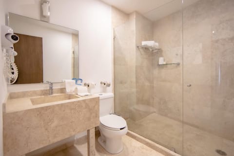 Shower, rainfall showerhead, hair dryer, towels