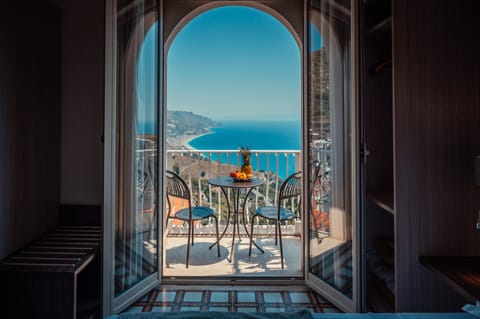 Deluxe Double Room, Terrace, Sea View | Minibar, in-room safe, desk, laptop workspace