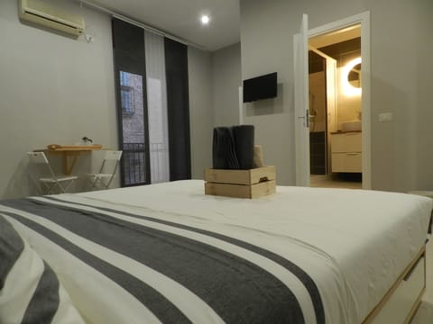 Family Quadruple Room, 1 Bedroom, Ensuite, City View | Desk, soundproofing, free WiFi, bed sheets