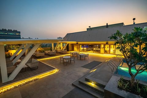 Rooftop bar, pool views, open daily