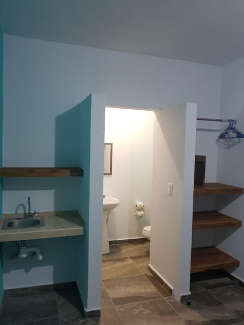 Desk, laptop workspace, blackout drapes, iron/ironing board