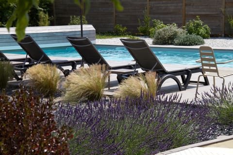 Seasonal outdoor pool, pool umbrellas, sun loungers