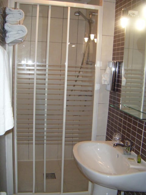 Shower, free toiletries, hair dryer, towels