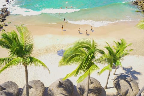 On the beach, kayaking