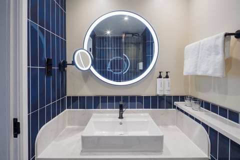 Eco-friendly toiletries, hair dryer, towels