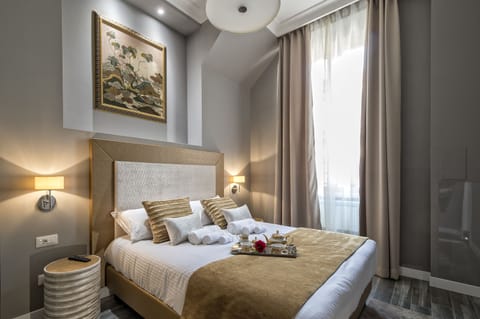 Double Room, City View | Pillowtop beds, in-room safe, desk, iron/ironing board
