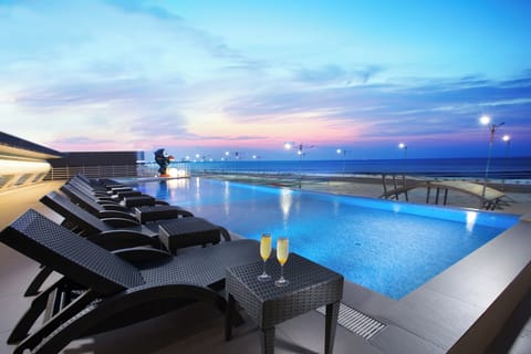 Seasonal outdoor pool, open 3:00 PM to 9:00 PM, sun loungers
