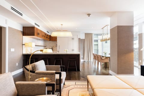 Suite, Multiple Beds (Residential, 2 King and 2 Queen Beds) | Living area | 55-inch flat-screen TV with satellite channels, TV