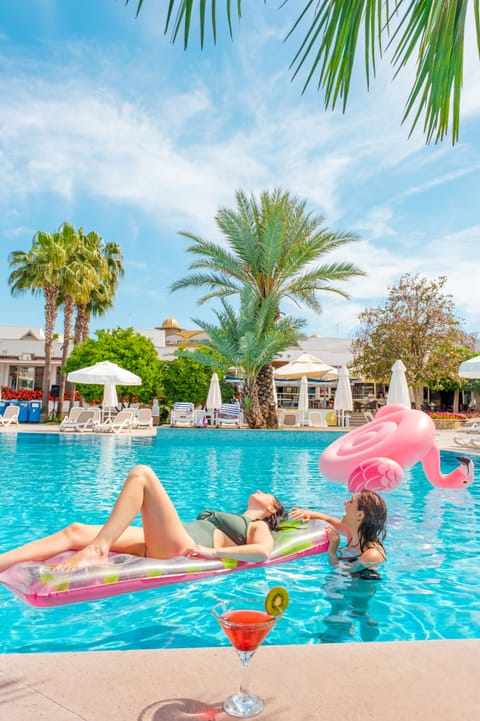 Seasonal outdoor pool, pool umbrellas, sun loungers