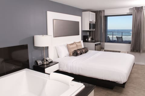 1 King Oceanfront, Jacuzzi Room | Premium bedding, pillowtop beds, desk, laptop workspace