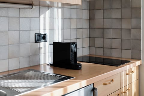 Microwave, stovetop, highchair, cookware/dishes/utensils