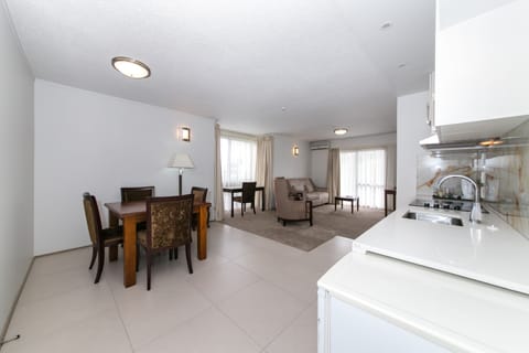 Two-Bedroom Family Room | Living area | 32-inch TV with cable channels