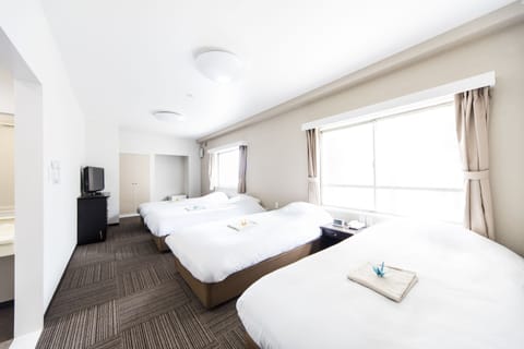 Standard Quadruple Room | Iron/ironing board, free WiFi, bed sheets