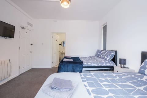 Family Triple Room, Multiple Beds (Family) | Iron/ironing board, free WiFi, bed sheets