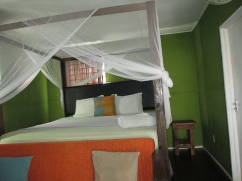 Basic Double Room, 1 Queen Bed, Shared Bathroom, City View | 1 bedroom, iron/ironing board, free WiFi