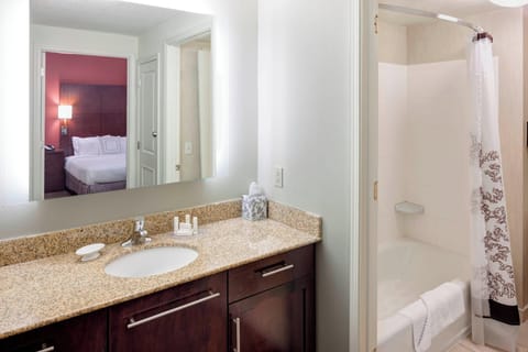 Suite, 1 Bedroom, Fireplace | Bathroom | Separate tub and shower, designer toiletries, hair dryer, towels