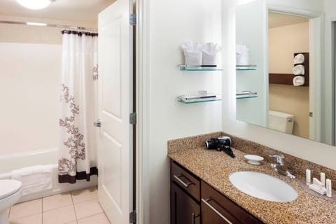 Separate tub and shower, designer toiletries, hair dryer, towels