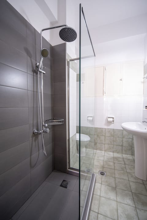 Shower, free toiletries, hair dryer, slippers