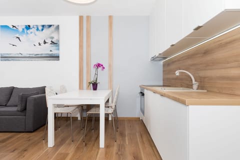 Apartment, 1 Bedroom | Living area | Flat-screen TV