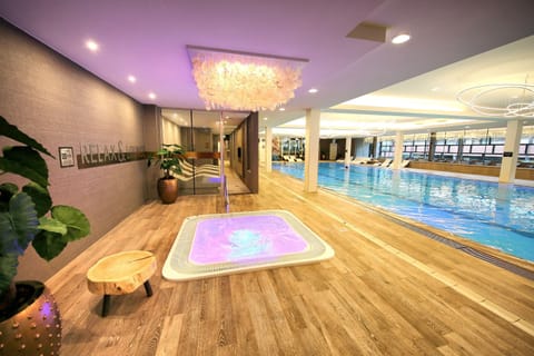 Indoor pool, open 7:00 AM to 11:00 PM, sun loungers