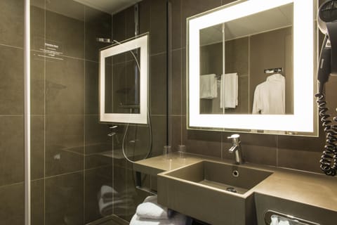 Shower, eco-friendly toiletries, hair dryer, towels