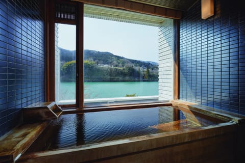 	Deluxe Suite with Hot Spring Bath, 1 Bedroom, Non Smoking, River View (113)  | Bathroom | Free toiletries, hair dryer, bathrobes, slippers