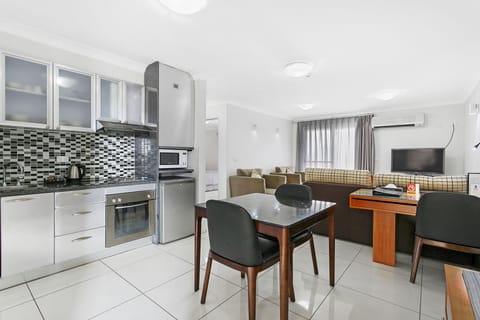 Two Bedroom Apartment | Minibar, in-room safe, desk, iron/ironing board