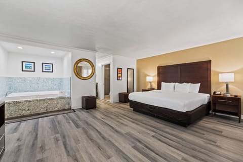 Suite, 1 King Bed, Non Smoking | Desk, iron/ironing board, free cribs/infant beds, rollaway beds